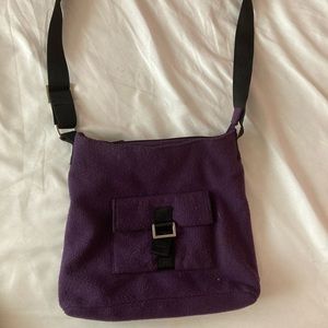 a 2017 dark purple shoulder bag.